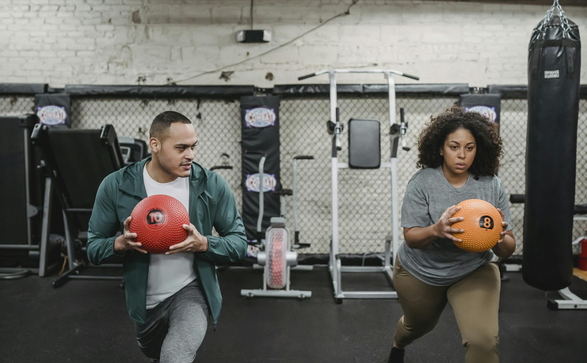young muscular ethnic male instructor in activewear