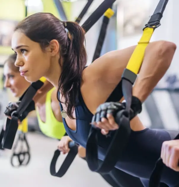TRX avec un coach sportif à domicile